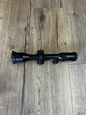 Firearm: Schmidt and Bender 8x56 