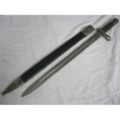 Firearm: Spanish M1913 Artillery Bayonet with Wooden Grips in its Leather scabbard 