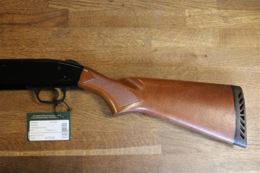 Firearm: Mossberg 500 Pump Hushpower Wood