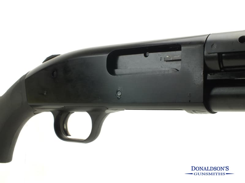 Firearm: Mossberg 590 Persuader