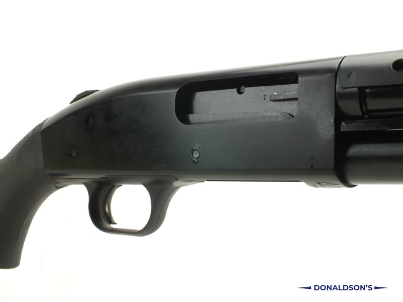 Firearm: Mossberg 590 Persuader